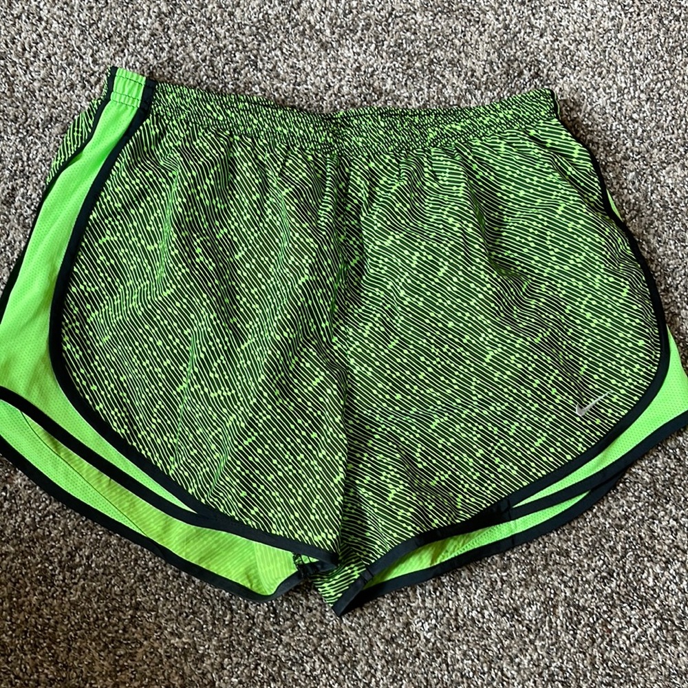 green nike shorts